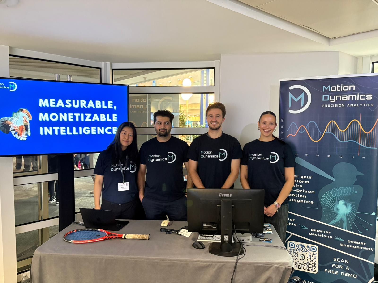 The Motion Dynamics team at a technology exhibition stand